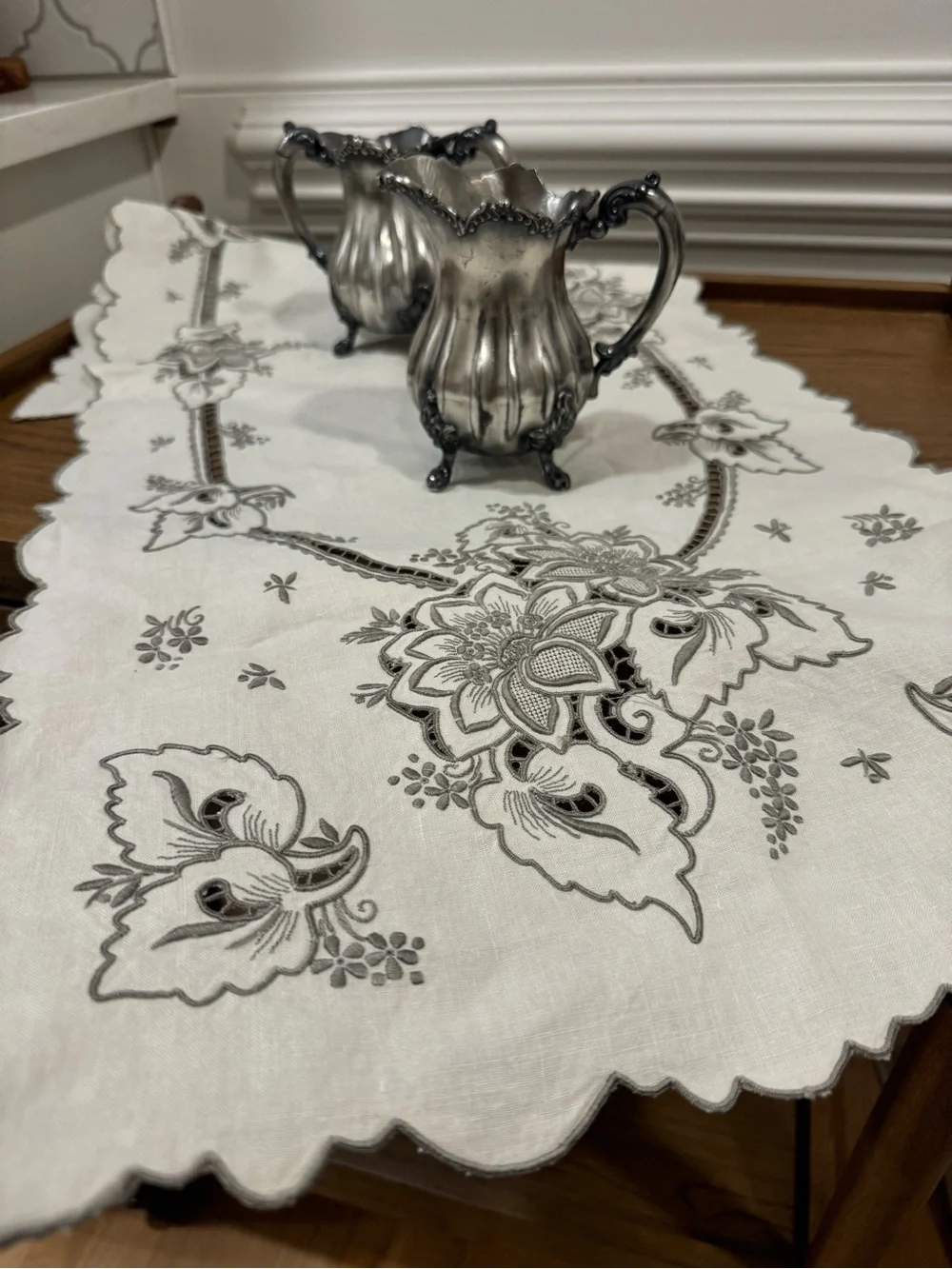 Elegant White Embroidered Linen Table Runner with Gray Floral Motif